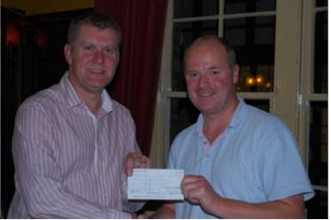 Nick receives YCS cheque fro Alastair